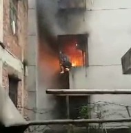 Man Cries for help When Being Trapped by Iron Bars in Burning Room