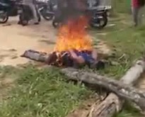 Thief Tied Up Beaten then Burned for Stealing