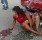 Bloody Woman Rolling Around in Pain With Husband Dead