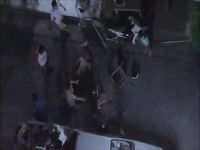 Man Dragged out of Building and Beaten by Mob