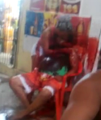 Crowd Watches Woman Cry and Straddle her Bloody Dead Husband