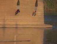 Peshmerga Hung Upside Down on Bridge After Execution