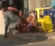 Man being stabbed to death in front of a bar in Brazil