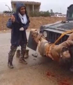 ISIS Dead Body Tied to Front of Truck and Beaten