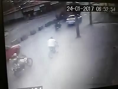 Drive by execution of a man riding his bycicle - cctv