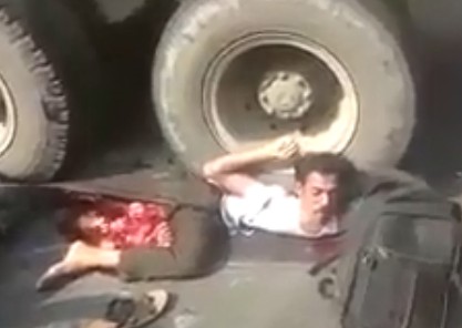 Everybody wants to film the guy in weird position crushed by truck