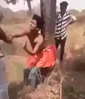 Young Crying Thief Tied to a Tree Brutally Beaten in India ...