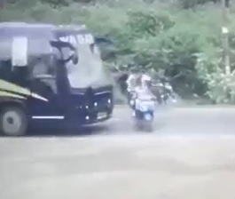 Bus Takes out Motorcycle 