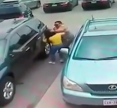 Fat Dude Beats Small Woman in Yellow over Parking Spot