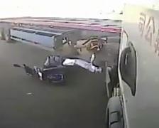 Dude on Motorcycle Crushed by Truck