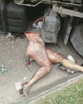 Woman Somehow Naked Crushed Underneath Bus