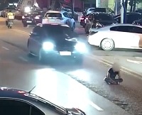 Darwin Winner Sits Down in the Middle of the Street