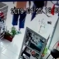 Police Officer Knocks out Store Clerk from Behind