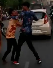 Violent Stabbing on a Busy Road