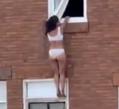Side Chick Dangles from Building...What Could Go Wrong?