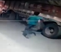 Dude Commits Suicide by Truck Wheel