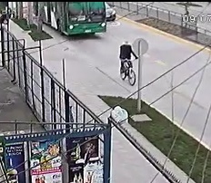 Bus Makes Bicyclist and Pole Become One