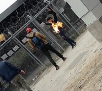 Moronic Protester Lights Himself on Fire...Instantly Regrets