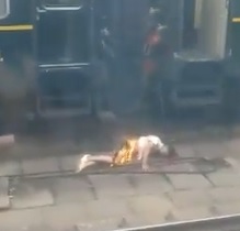 Damn Toasty! Dude Frying on Train Platform (Electrocuted)