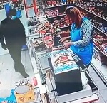 Man in a Covid Mask Attacks Female Store Clerk