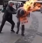 Moron Lights Himself on Fire During Protest (4vids)