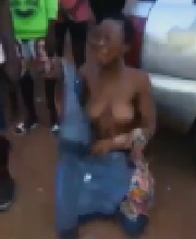 Female Thief Stripped & Beaten By Mob.