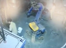 Work Accident: Robot Pushes Dude into Furnace