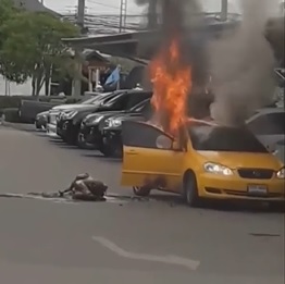 Taxi Spontaneously Catches Fire.