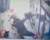 Two Viscous Dogs Attack Man at Market.
