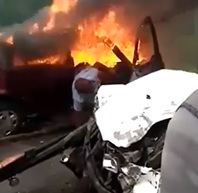 SIZZLE: Dude Trapped in Burning Car.
