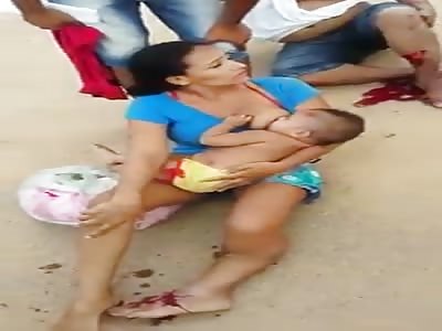 AFTER THE ACCIDENT, MOTHER BREASTFEEDS HER CHILD