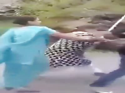 Nepali women beating young girl