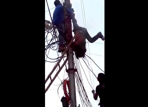 Man still Burning After being Electrocuted is Rescued From Pole