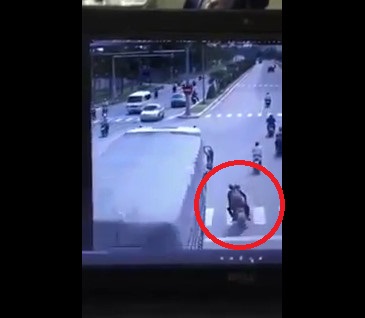 (Other Angle) Truck Passes Over a Man And His Motorcycle