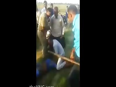 Thief Beaten With Sticks By Public