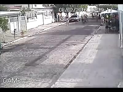 RIDER HITS CHILD AND IS BEATEN BY POPULATION