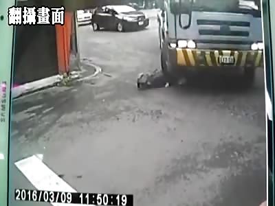 WOMAN ON BICYCLE HAS LEG CRUSHED BY TRUCK