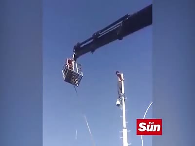 SUICIDAL MAN LEAPS FROM POLE TO EVADE FIREFIGHTERS