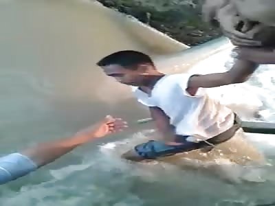 DROWNED BOY IS REMOVED FROM WATER