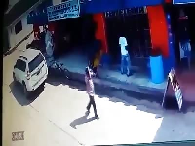 STORE OWNER BEING MURDERED IN THE MIDDLE OF THE STREET