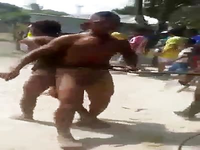 TWO NAKED GUYS TIED AND BEATEN BY MOB