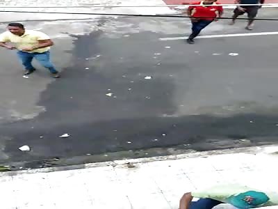 THIEF BEING BEATEN BY MOB