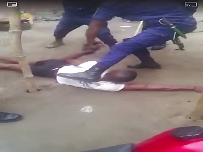 MAN BEING BEATEN BY POLICE