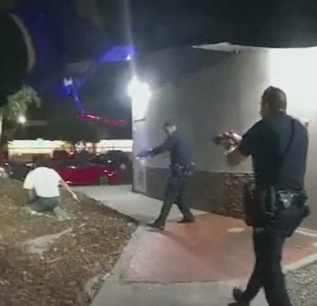 Bodycam Video Shows Police Fatally Shoot Armed Man Behind Fast-Food Restaurant