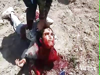 MAN BEING BEHEADED BY RELIGIOUS FANATICS.