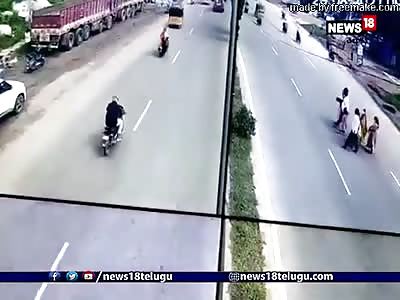 BIKE COLLIDED WITH FAMILY CROSSING THE ROAD