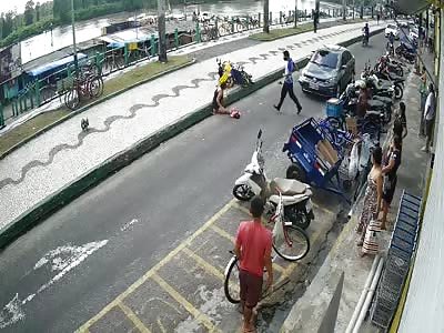  MOTORCYCLE BEING RUN OVER BY CAR