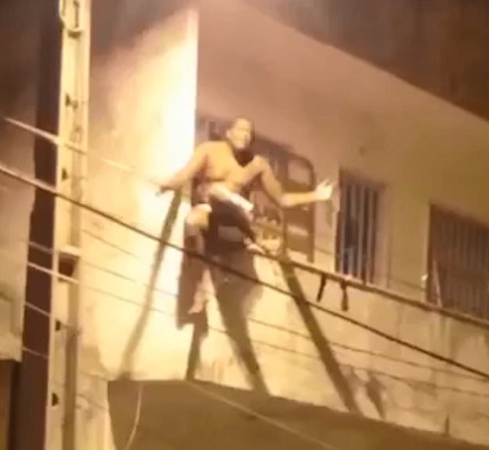 Crazy Man Takes a Nice Tumble from Balcony