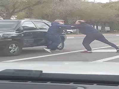  Two guys fight over traffic crash