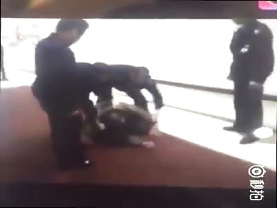 pickpocket is caught and beaten by security guards
